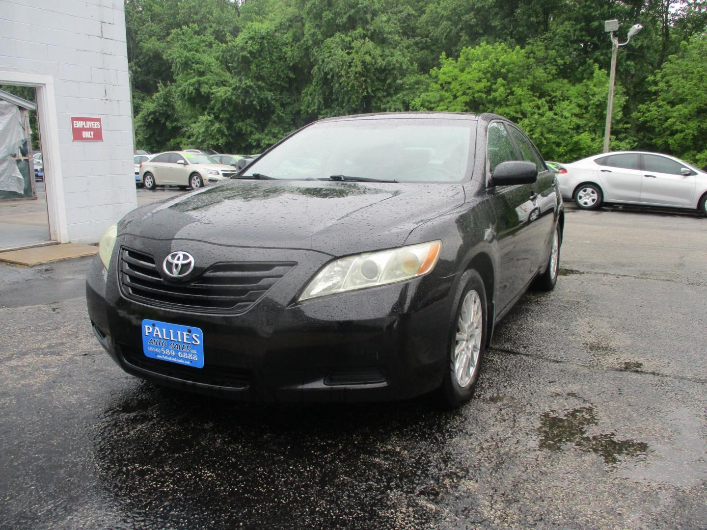 2007 BLACK Toyota Camry LE V6 (4T1BK46KX7U) with an 3.5L V6 DOHC 24V engine, 6-Speed Automatic Overdrive transmission, located at 540a Delsea Drive, Sewell, NJ, 08080, (856) 589-6888, 39.752560, -75.111206 - Photo#0